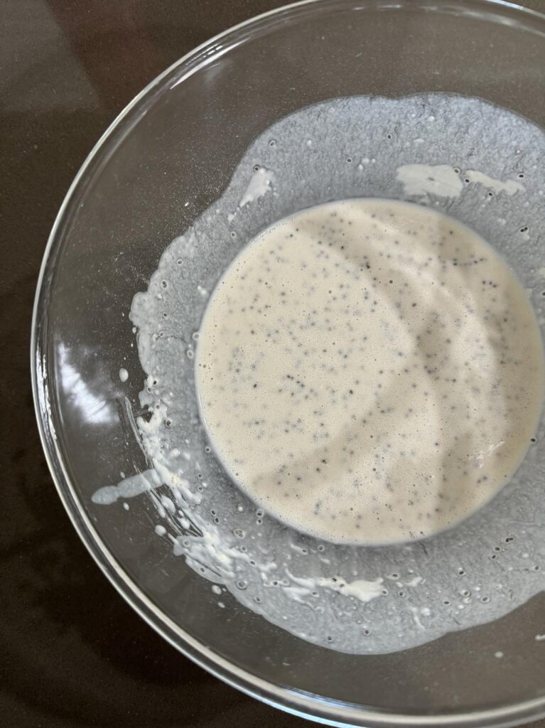 Pancake batter resting to get bubbly before frying.