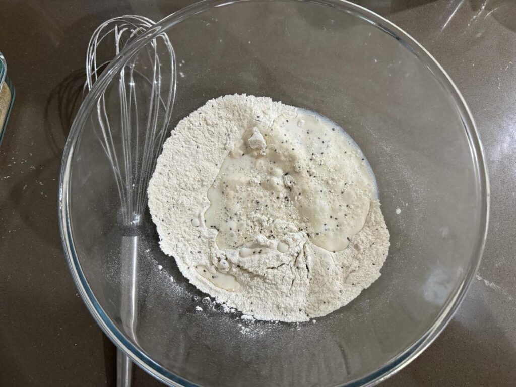 Eggless pancake batter. About to stir in milk with whisk.