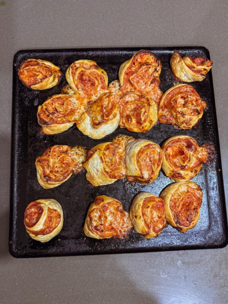 Super simple and delicious pizza scrolls for kids fresh out of the oven