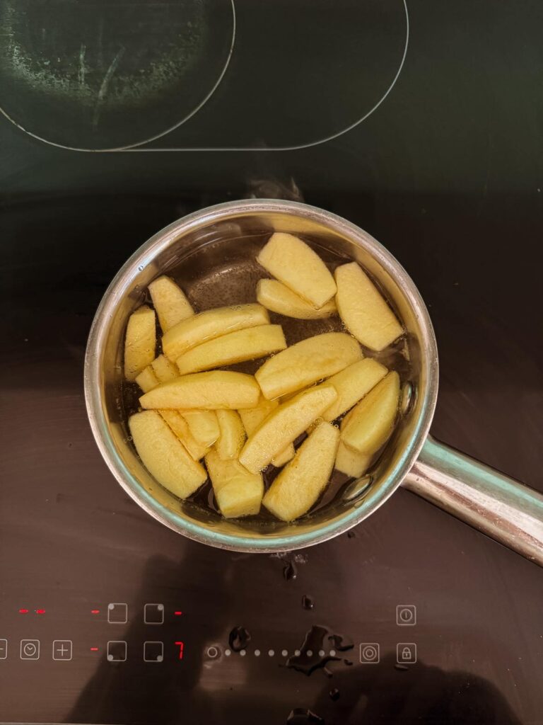 Fruity Gelatin Gummies for Kids' Wellness: apples stewing over stove top