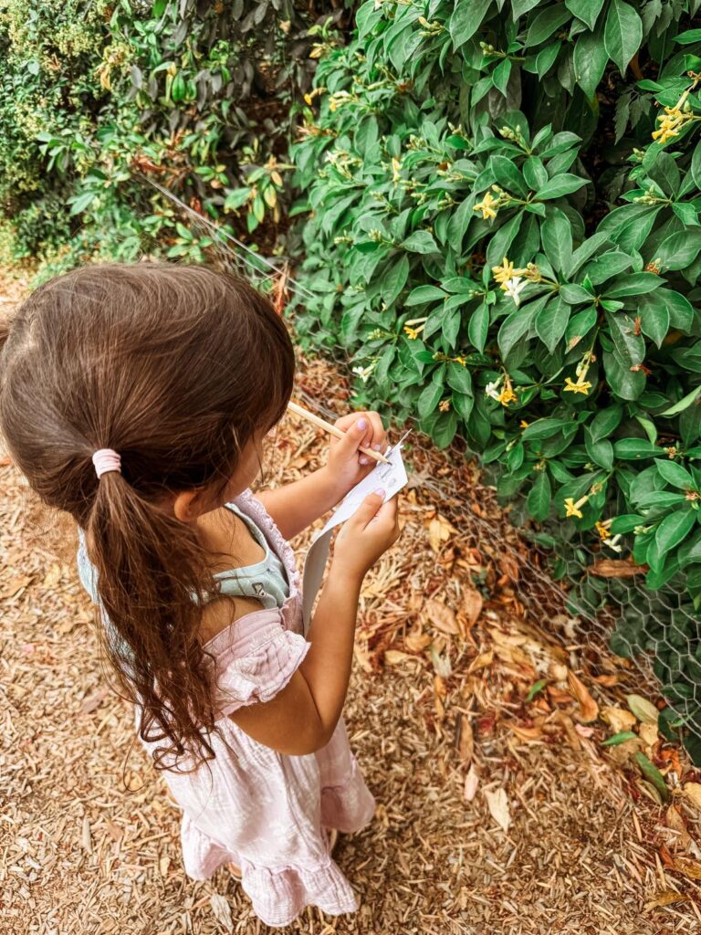 How to overcome challenging homeschool days: girl drawing a flower.