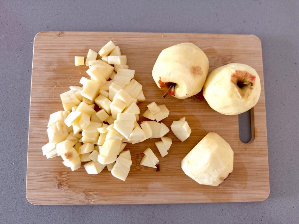 Healthy homemade applesauce for kids: peeling and chopping up apples